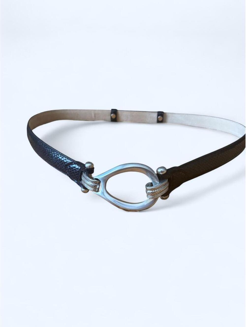 Unique belt with silver buckle and black snakeskin texture